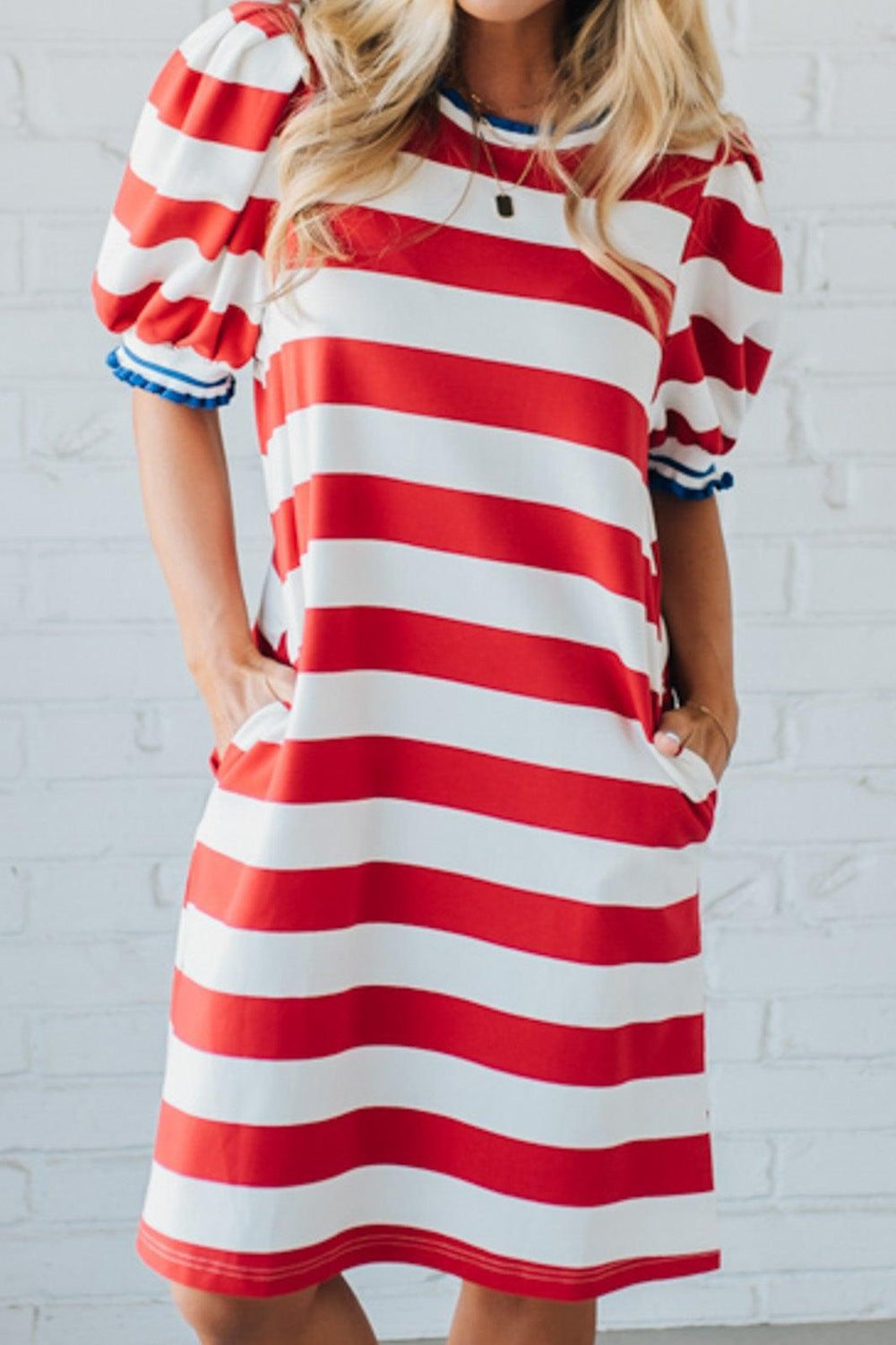 Striped puff sleeve mini dress with blue trim and pockets