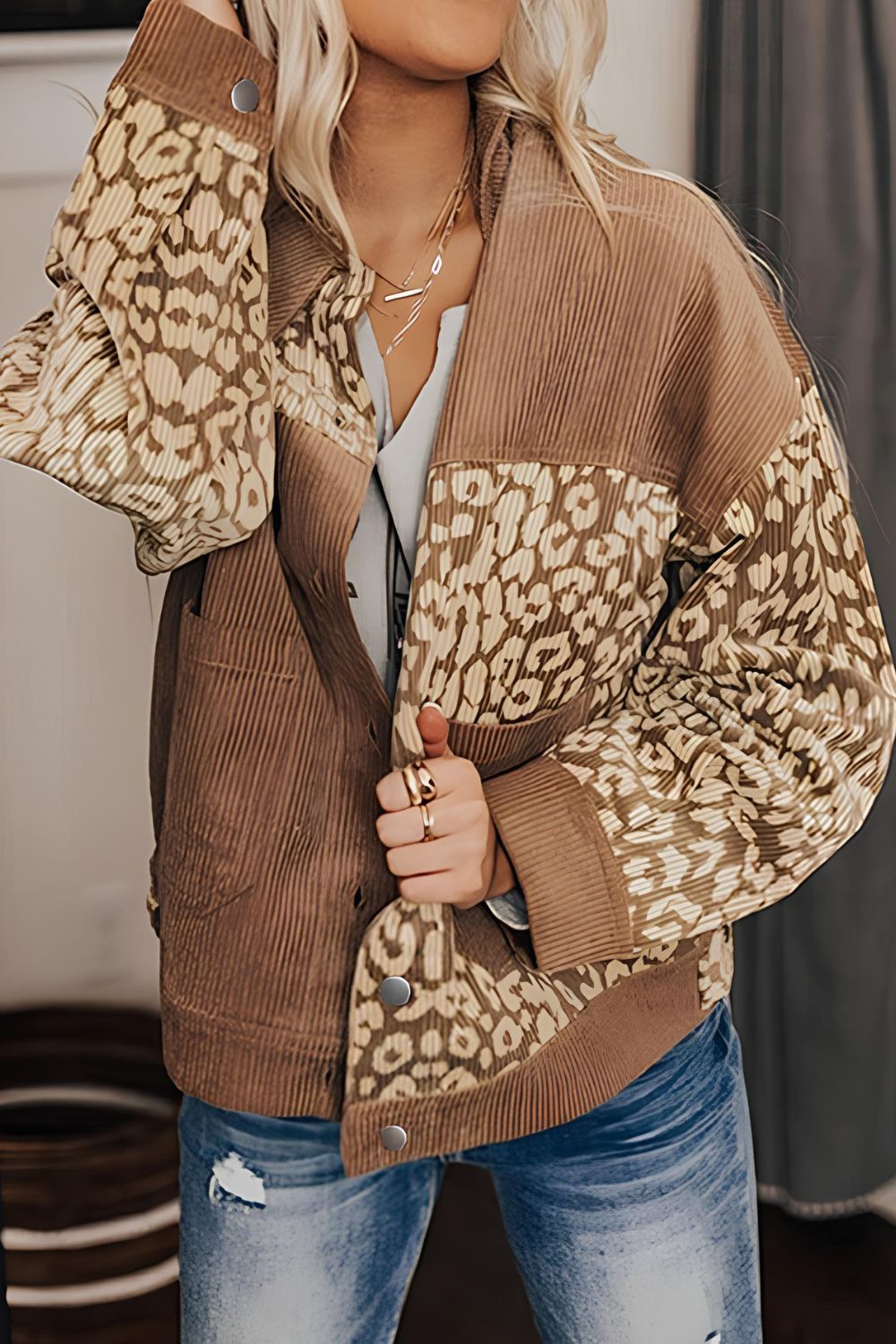 Camel corduroy jacket with leopard print panels and button front.