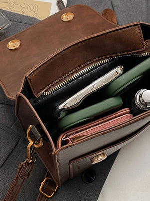 brown with backpack with top handle
