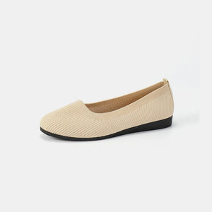 Khaki textured knit slip-on flats with a black sole.