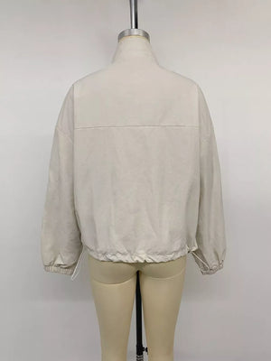cream windbreaker