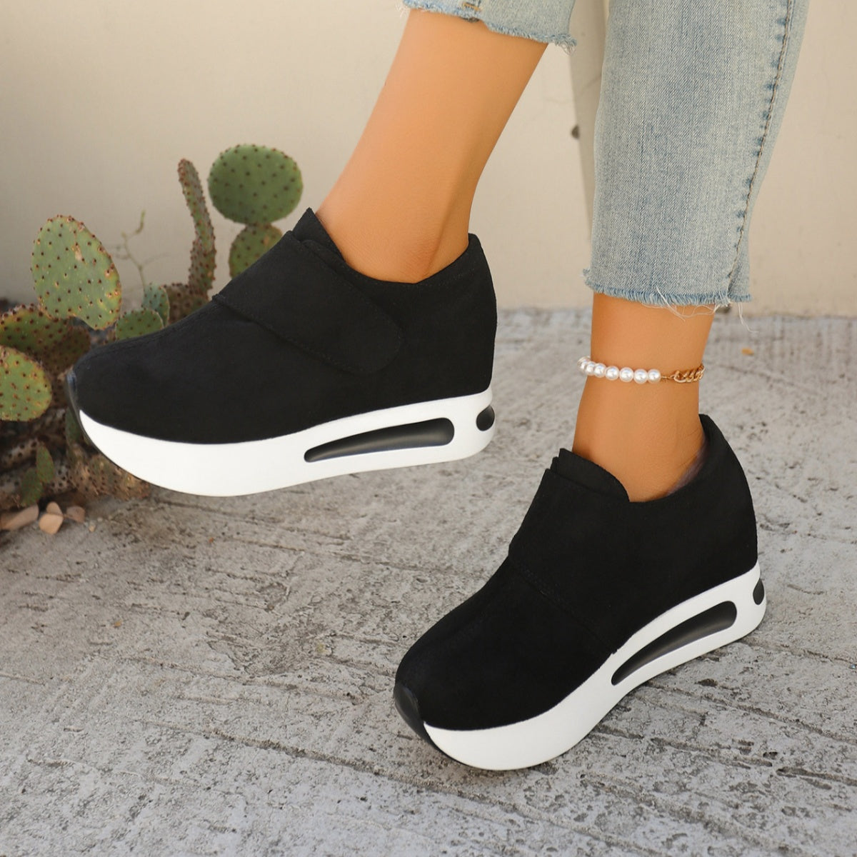 Black chunky platform sneakers with air cushion and hook-and-loop strap