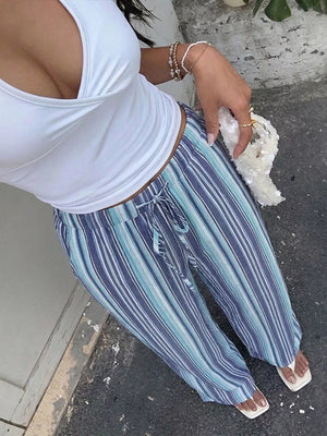 Lively striped drawstring wide-leg pants in blue and white with a relaxed fit.