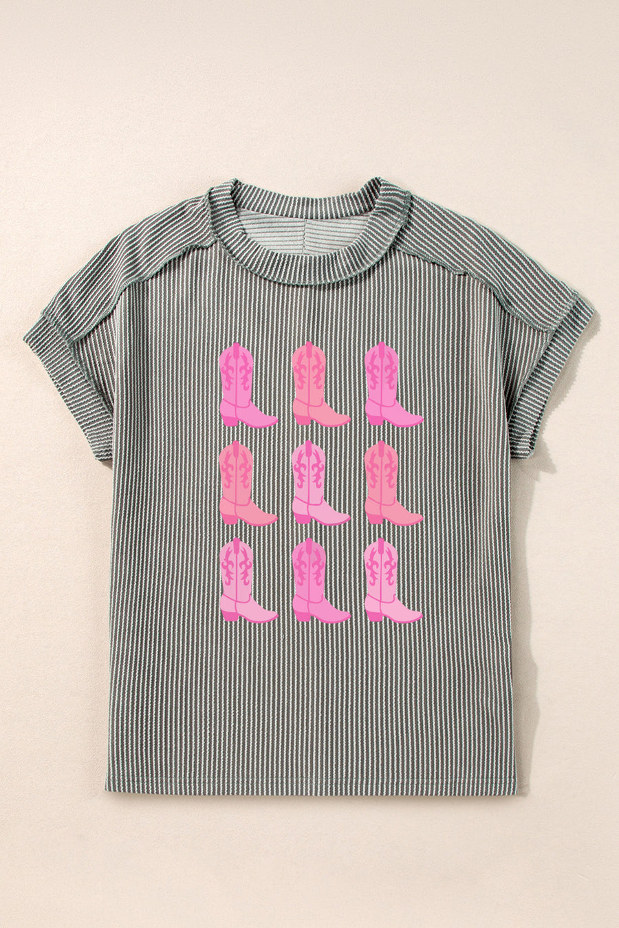 Dark gray striped t-shirt with a print of pink cowboy boots.