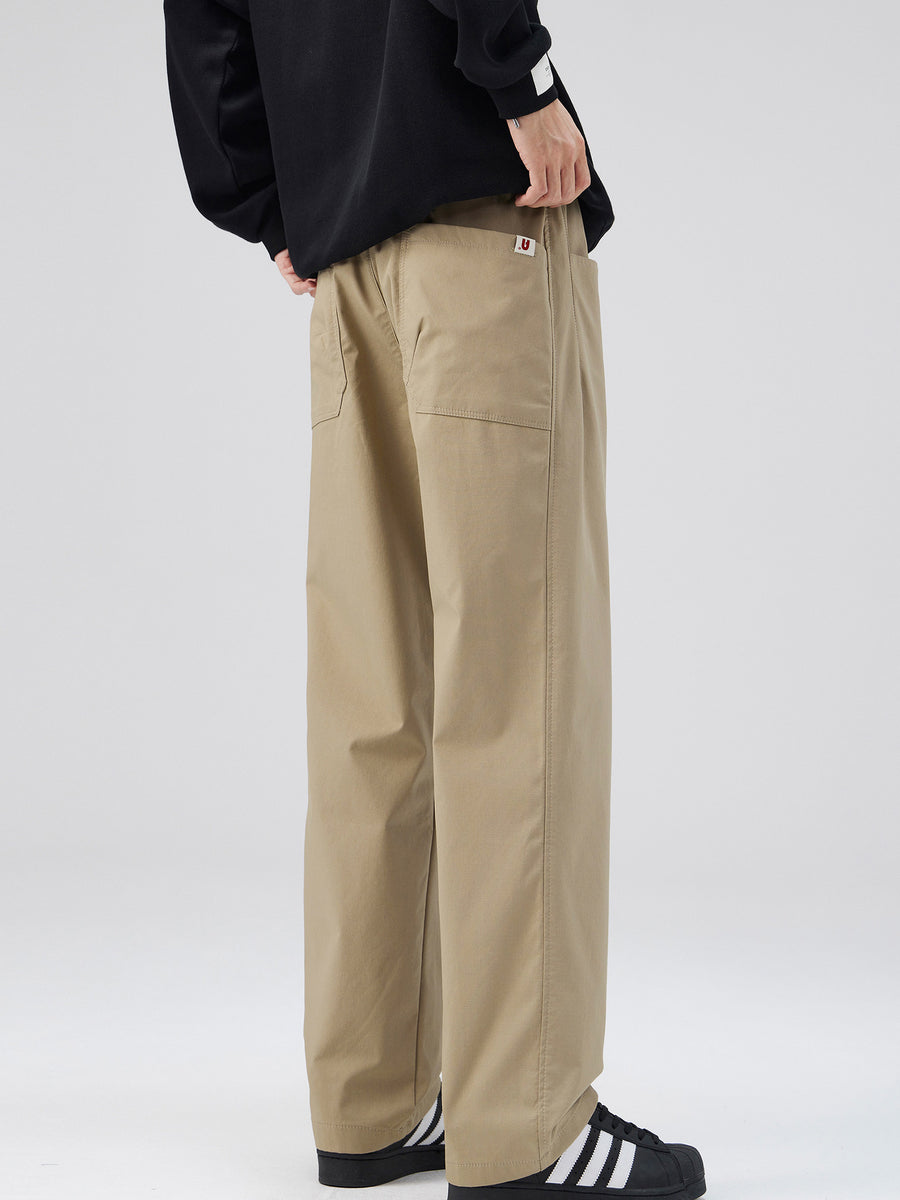 Khaki wide leg pants with elastic waist and patch pockets