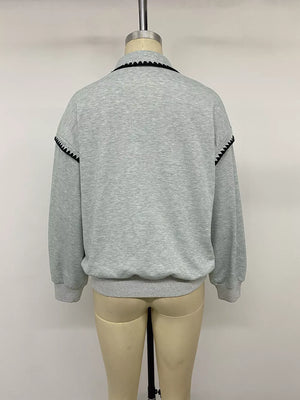 light grey sweatshirt