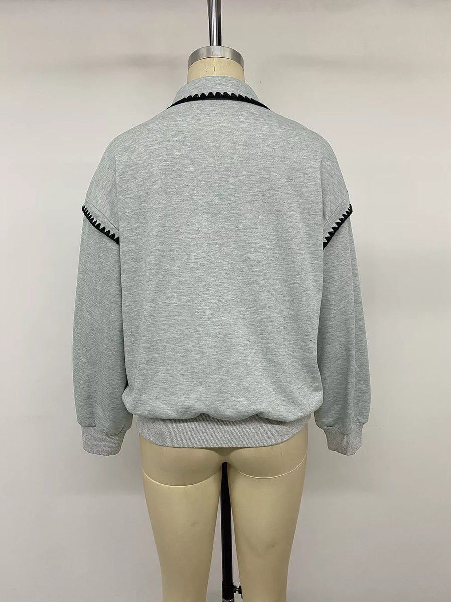 light grey sweatshirt