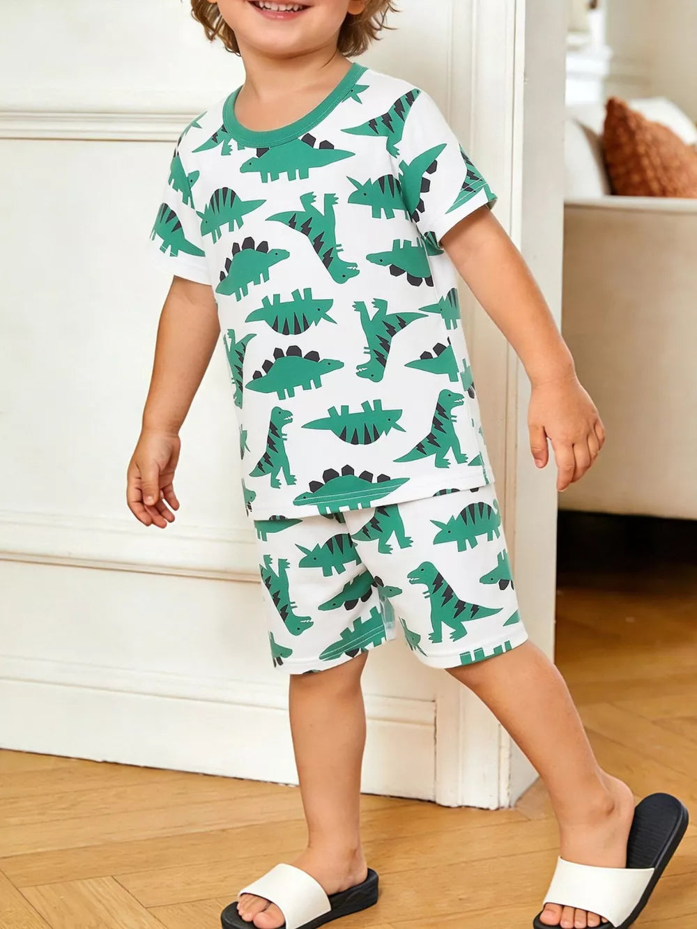 Baby boys white cotton blend dinosaur print tee and shorts set with green trim
