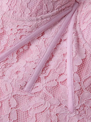 Pink lace midi dress with sheer sleeves and ribbon detail