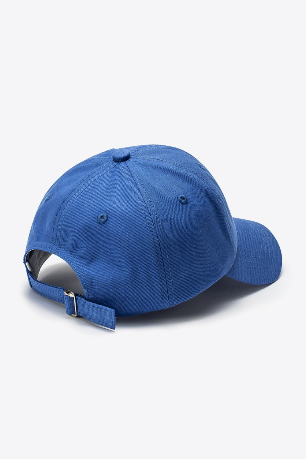 Cobalt cotton baseball cap with adjustable strap and metal buckle detail