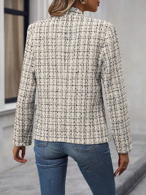 Textured tweed open-front blazer in beige with black plaid pattern.