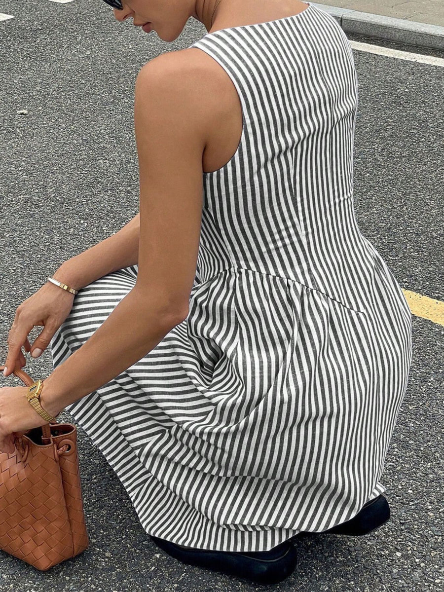Black and white striped midi dress with square neck and a-line skirt.