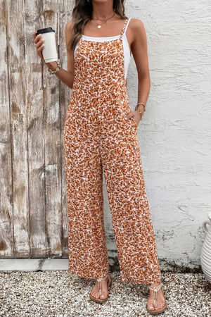 Abstract floral wide-leg romper with pockets and a white tank top.