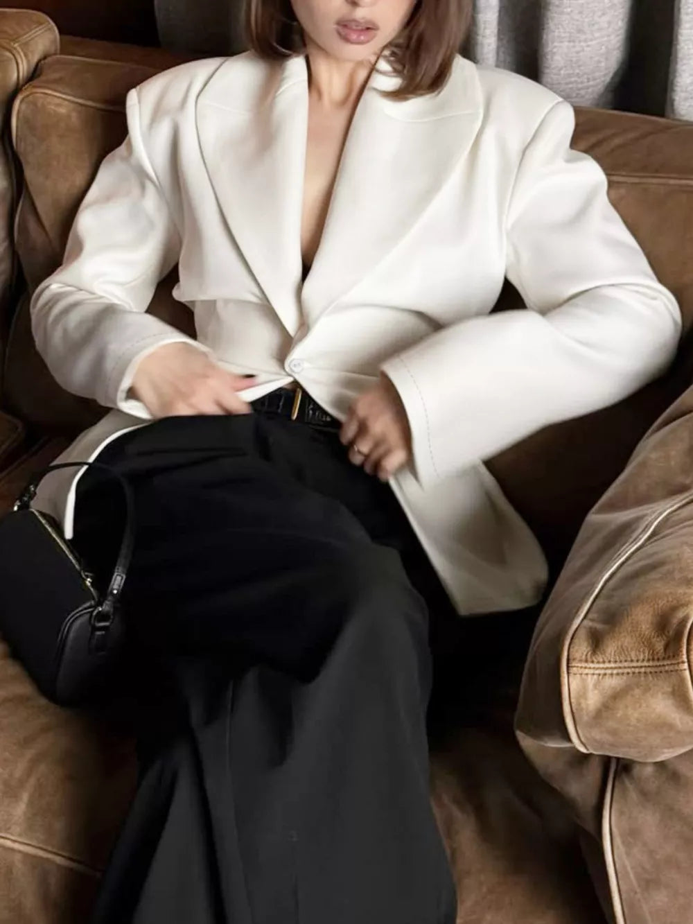 cream blazer with buttoned and long sleeve