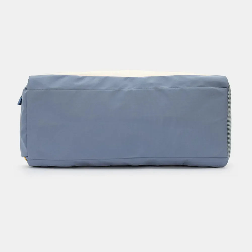 Colorblock gym duffel bag in dusty blue and beige with a mesh side detail.