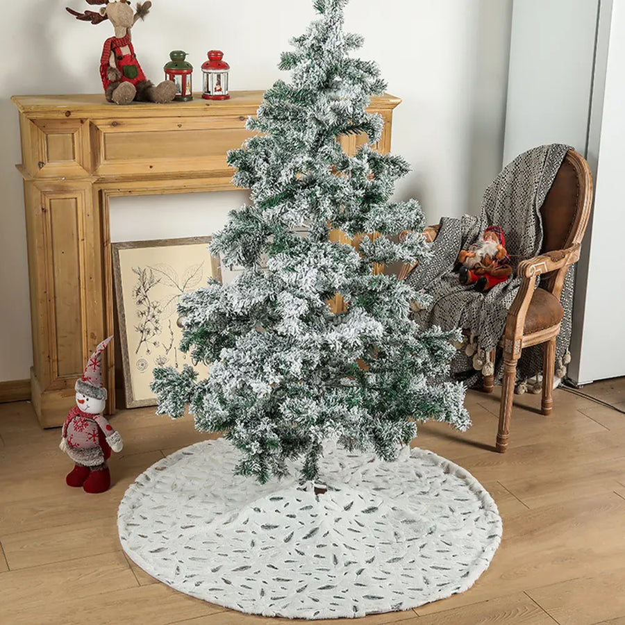 White Christmas tree skirt with a gray feather pattern, plush material