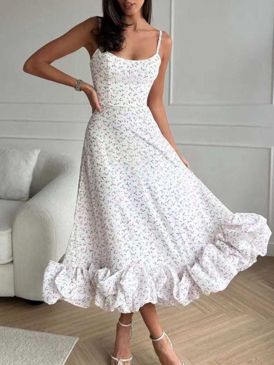 White floral midi dress with ruffle hem and spaghetti straps
