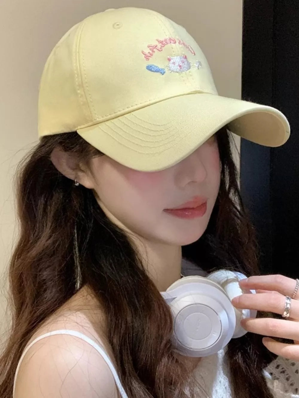 Yellow baseball cap with cat and fish embroidery, curved brim