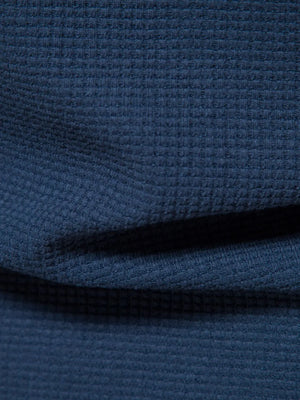 Navy textured crew-neck t-shirt knit with a waffle weave pattern.