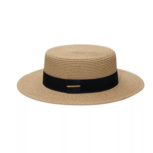 Chic straw boater hat in beige with black band and gold detail.