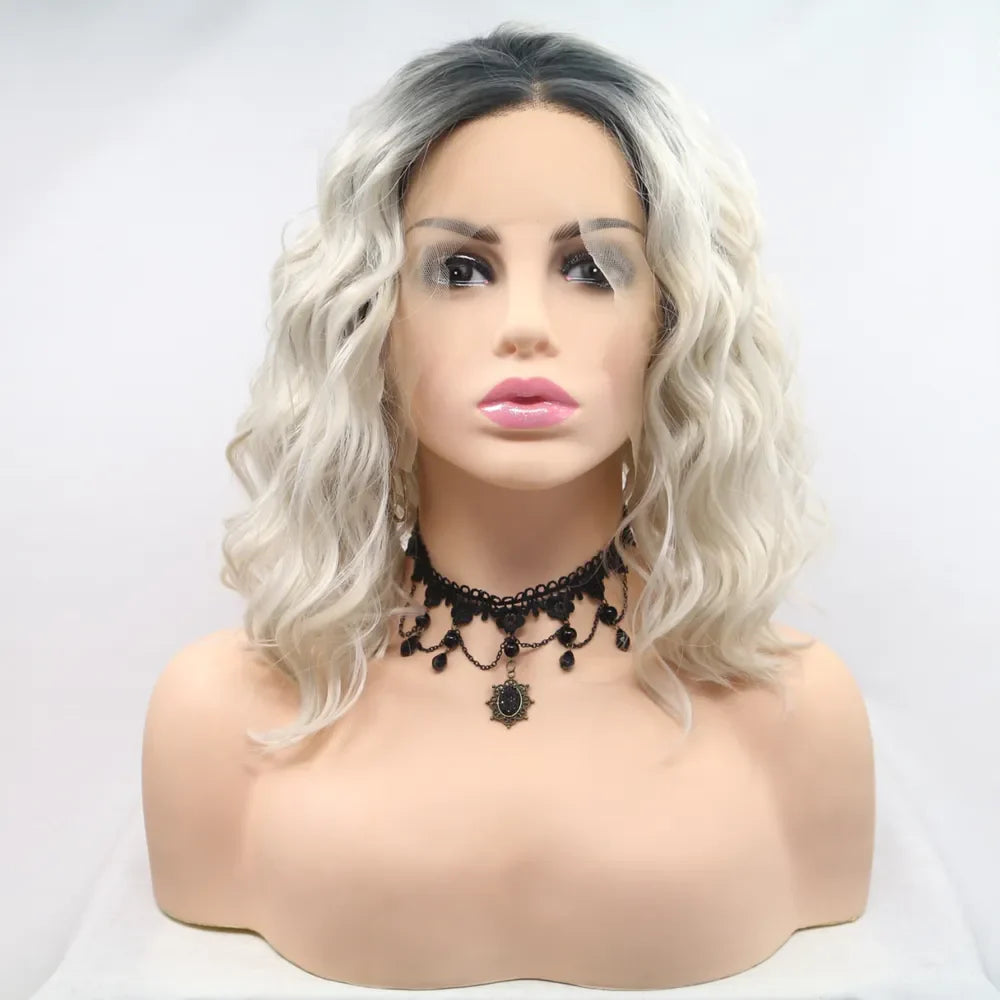 Ombre wave front bob wig in black and white with a lace front and loose curls.