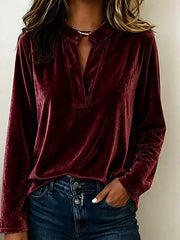 Black blouse with notched neckline and long sleeve