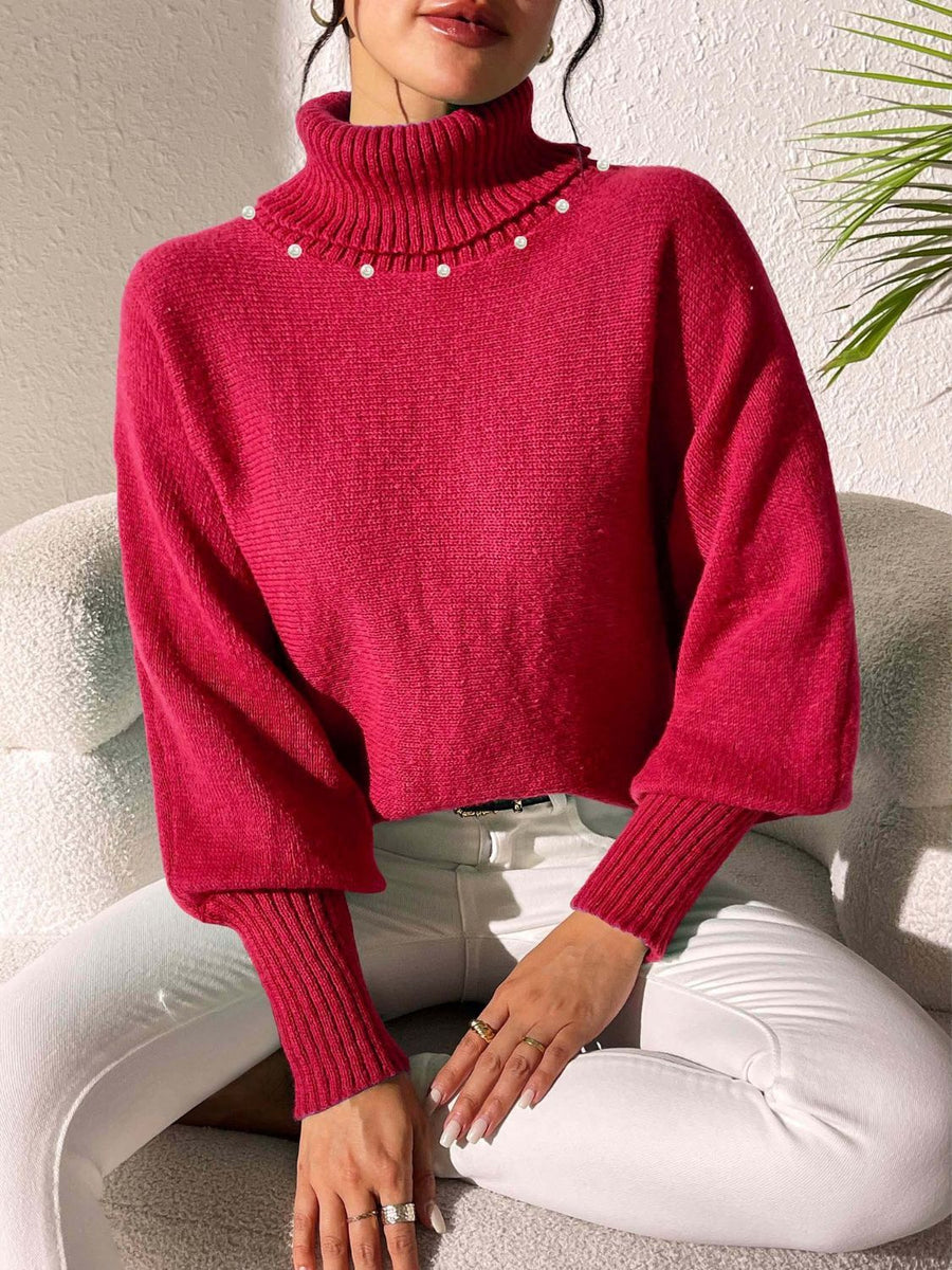 Deep Red knit sweater with turtleneck and pearl embellishments on collar, dolman sleeves.