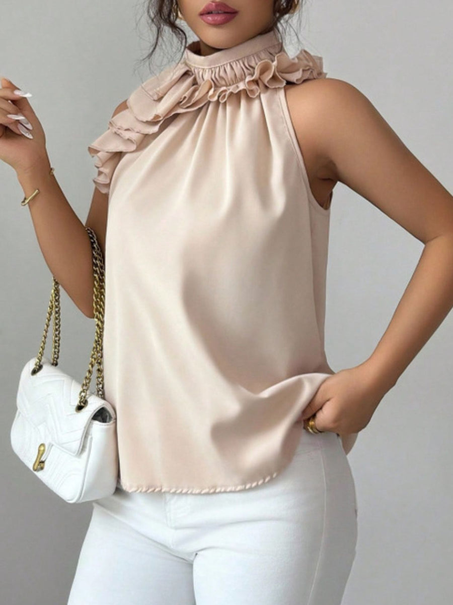 Apricot ruffled high neck sleeveless blouse with a flowy fit.