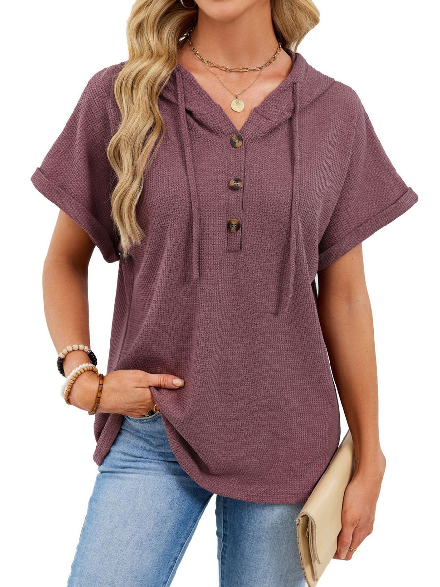 Waffle knit short sleeve hooded top in brick red with button placket and drawstring.
