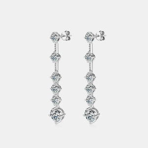 Silver cascading diamond drop earrings with multiple brilliant-cut stones.