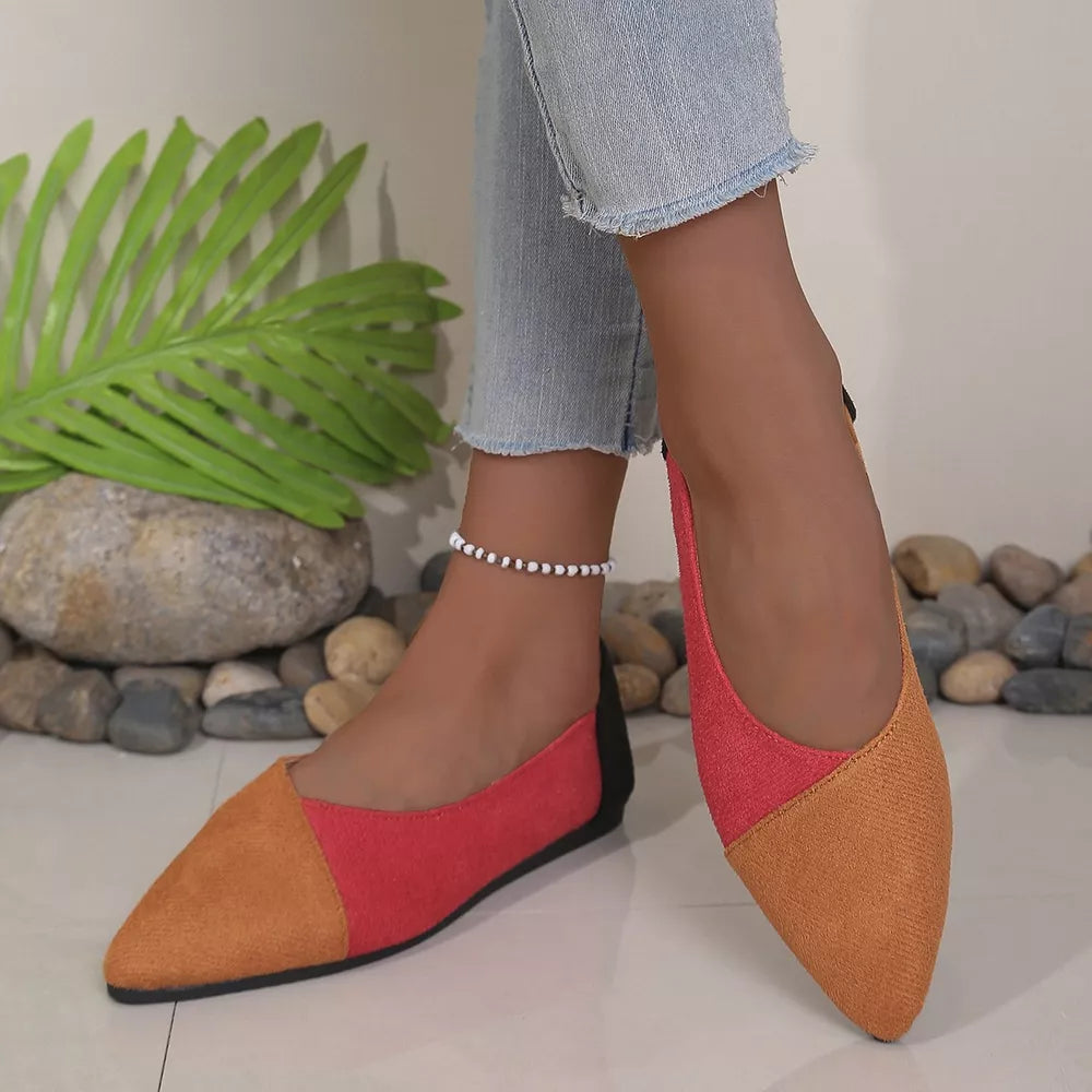 Chic pointed-toe slip-on flats in color block tan, red, and black.