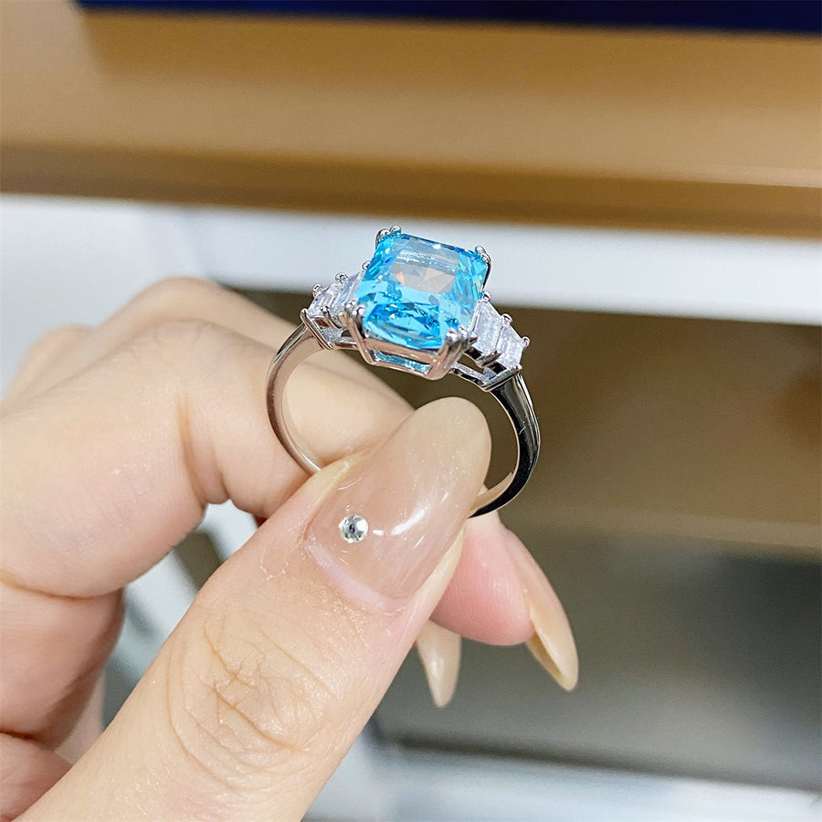 ring in aqua blue with geometric and zircon stones
