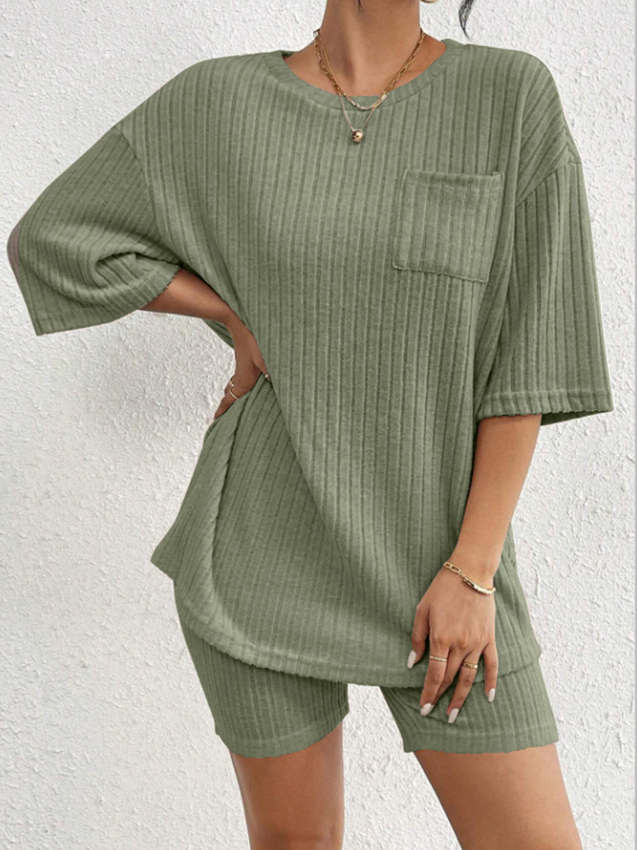 Sage ribbed loungewear set with a pocket tee and biker shorts.