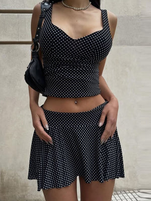 Black polka dot crop top and flared mini skirt set with sweetheart neckline