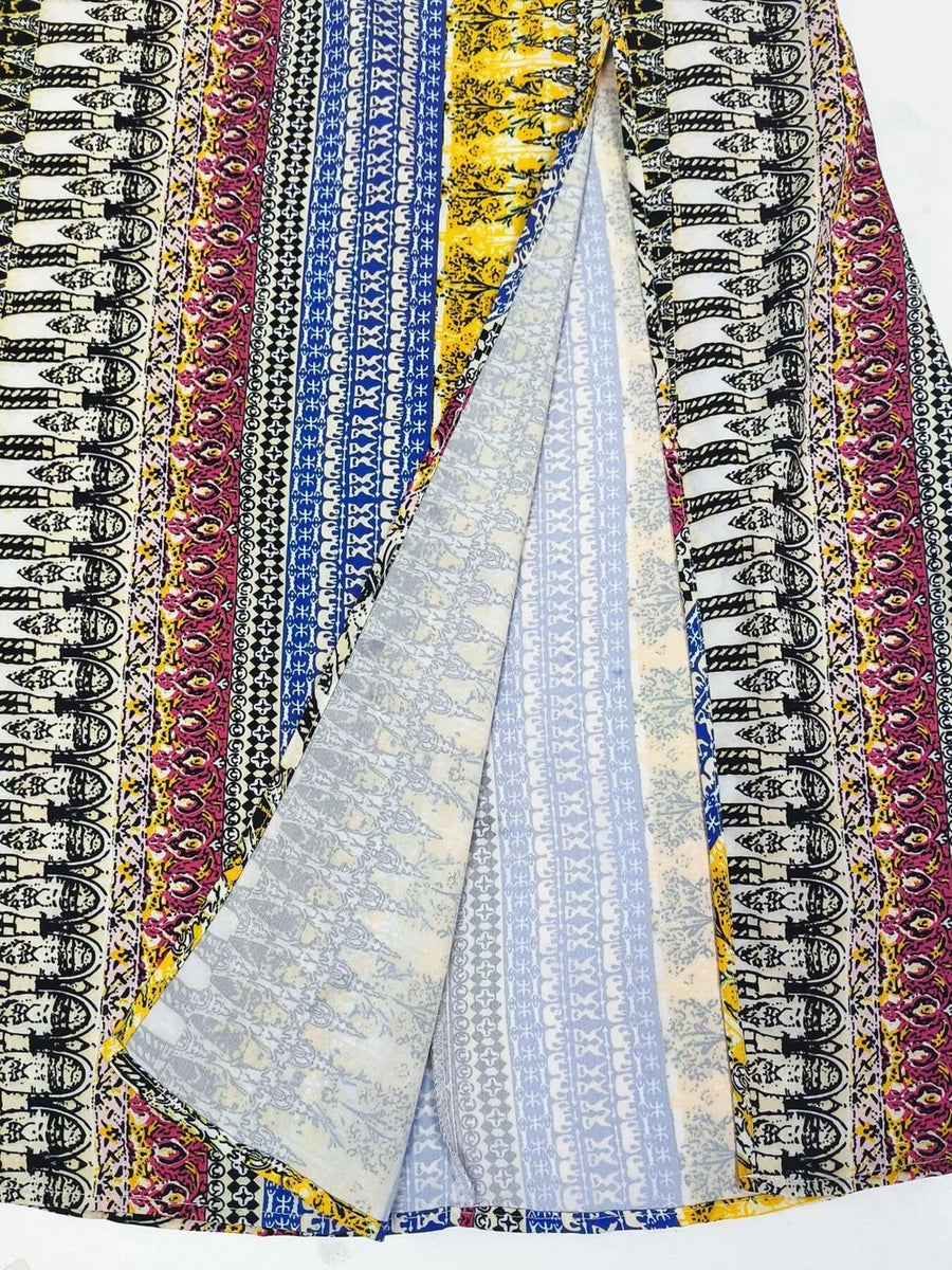 Bohemian maxi dress with colorful vertical stripes and a high slit.
