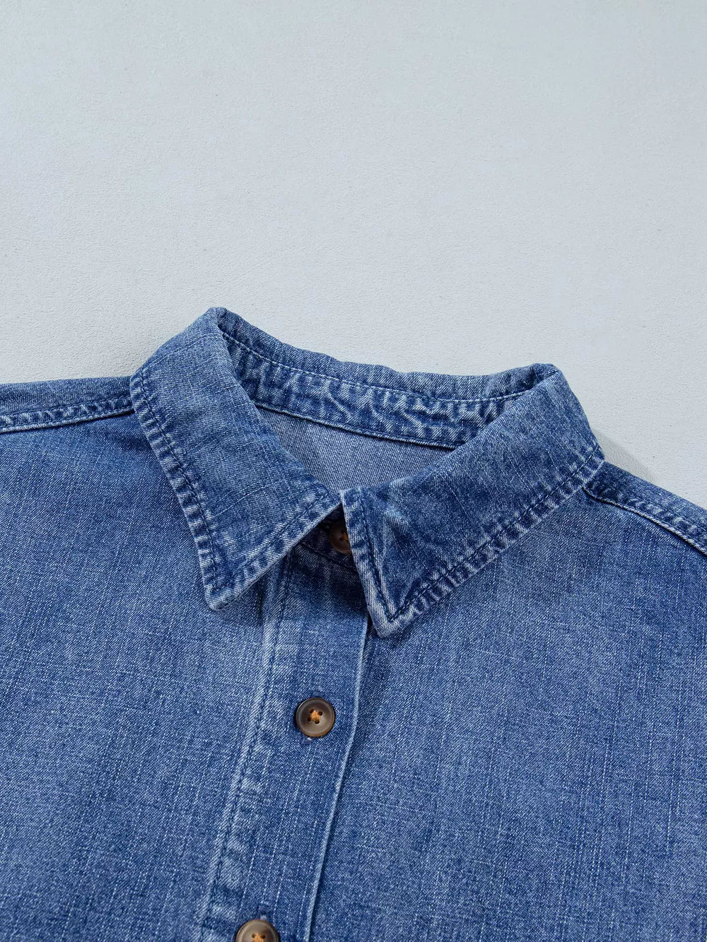 denim blue button-up shirt