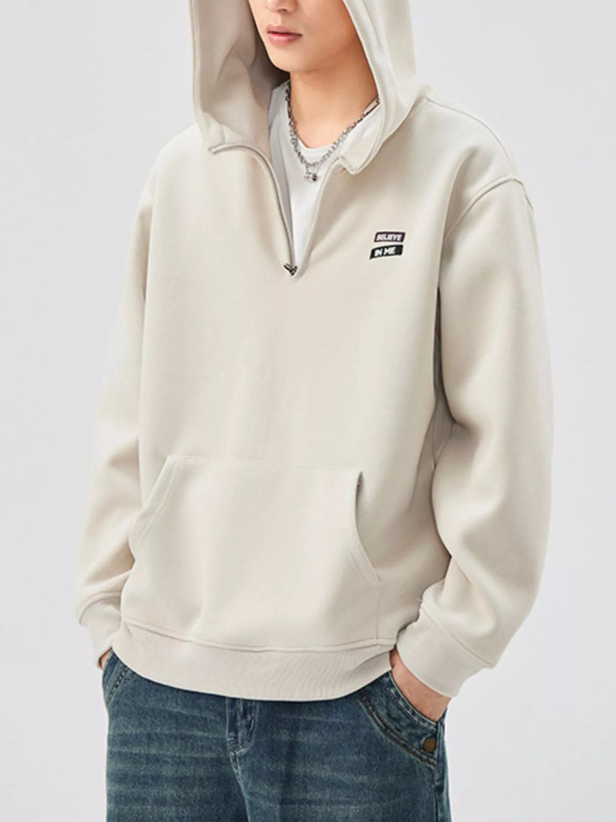 Plus-size quarter-zip hoodie in Dust Storm with graphic detail and front pocket.