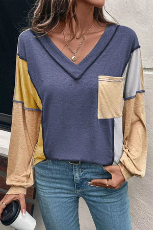 Contrast stitch V-neck t-shirt in dusty blue with colorblock sleeves and chest pocket.