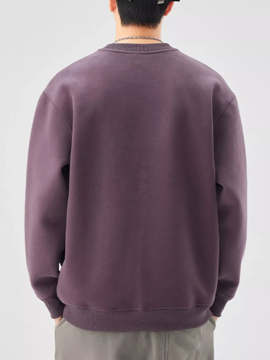 Men's oversized purple crewneck sweatshirt with ribbed cuffs and hem