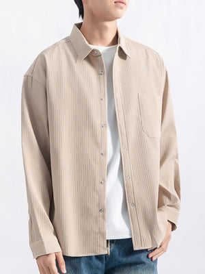 Black button-down shirt with hip-length and button-front