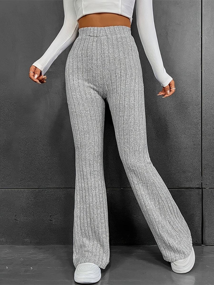 Gray ribbed flare trousers in 100% polyester with a high waist and bootcut leg.