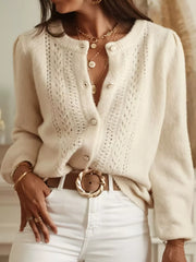 Apricot eyelet detail long sleeve button-down cardigan with puff sleeves.