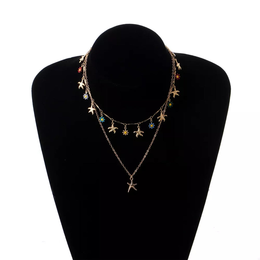 necklace featuring starfish in Gold with 18K Gold-Plated, Alloy Care instructions: Avoid wearing during exercise, as swea