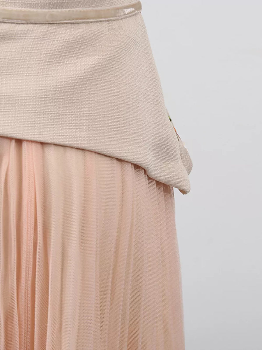 Embroidered tulle midi dress with sheer sleeves in a light pink hue, featuring a textured bodice.