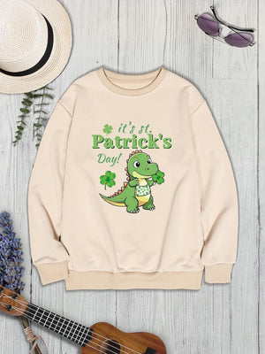 Khaki St. Patrick's Day sweatshirt with a cartoon dinosaur graphic and shamrocks.