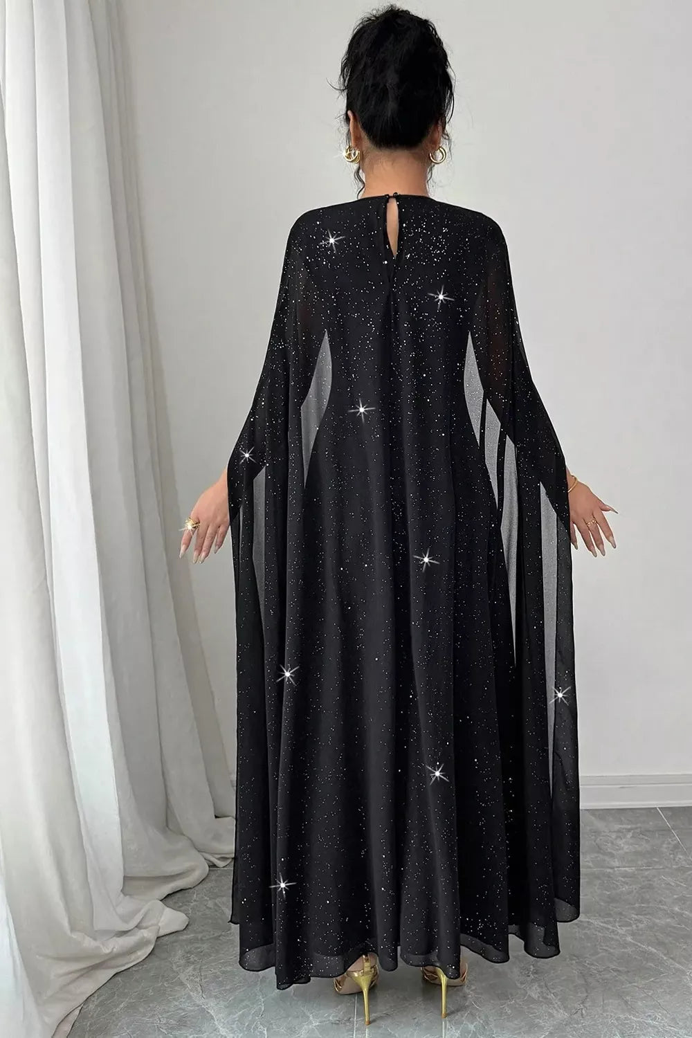 100% polyester Care instructions: Machine wash cold maxi dress in Black with fitted silhouette