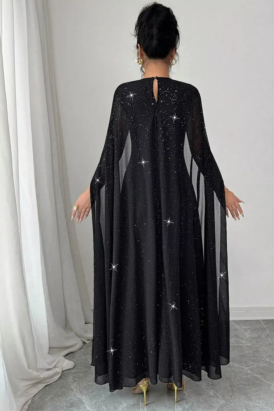 100% polyester Care instructions: Machine wash cold maxi dress in Black with fitted silhouette