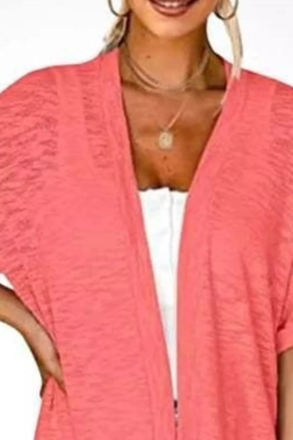 100% polyester Care instructions: Machine wash cold cardigan in Black with relaxed silhouette