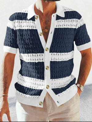 Navy and white striped crochet polo shirt with short sleeves and a button-up front.