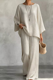 two-piece set in ivory featuring boat neck and relaxed fit